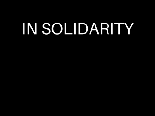Black box featuring the words solidarity