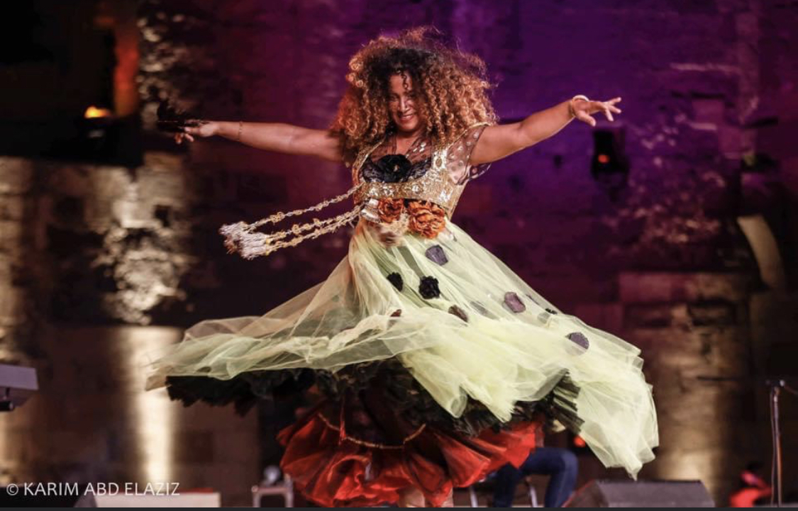 Ghalia Benali on stage dancing