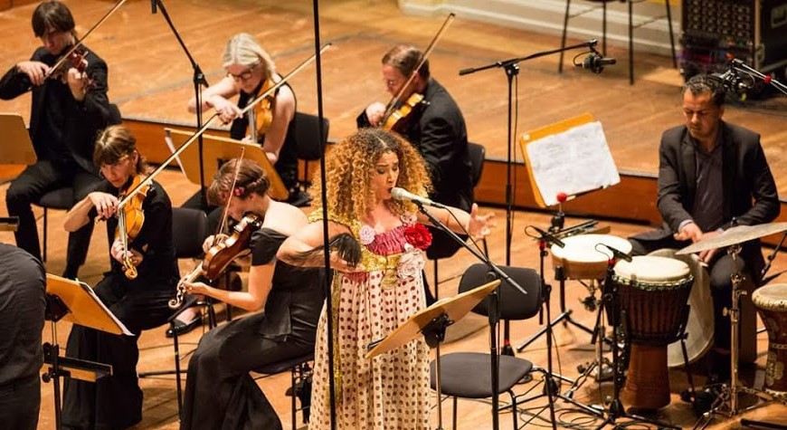 Photo of Ghalia Benali performing with an orchestra