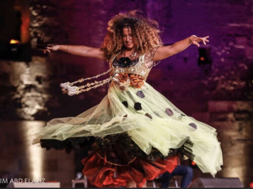 Ghalia Ben Ali dancing on stage